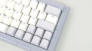 A cropped picture of a mechanical keyboard that's compatible with Lego. Because where's the fun if we can't hide some Lego in this thing?